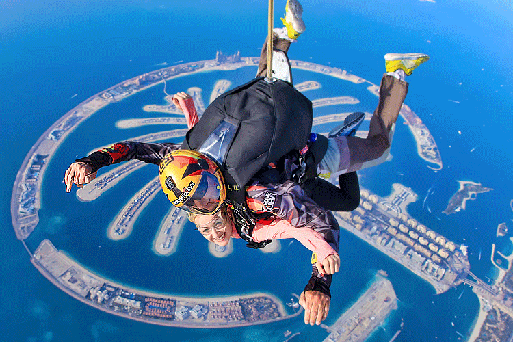 Instructor helping the tourist in Sky Diving on Palm Jumeirah 